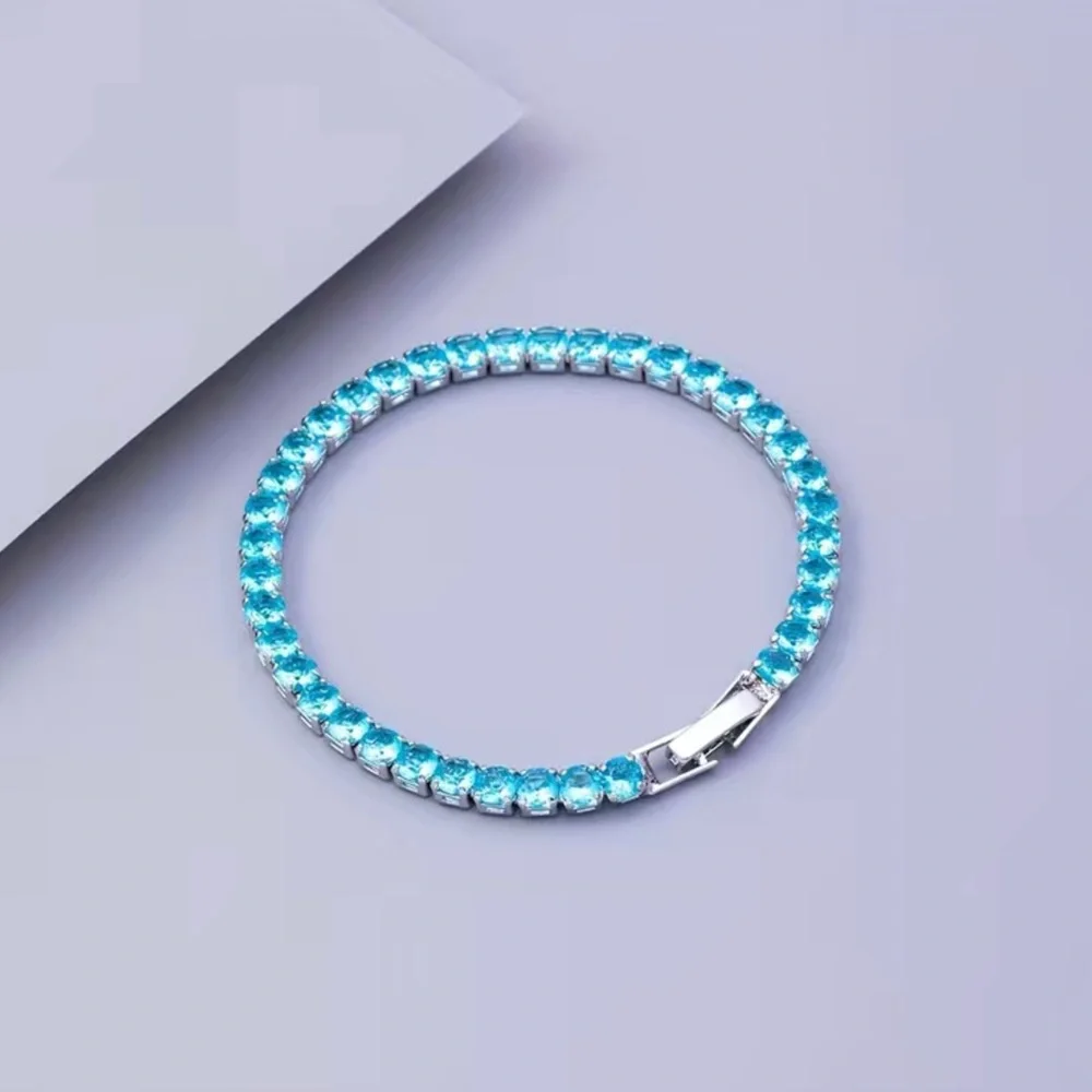 Beautiful Round Blue Topaz Bracelet In White Gold - Picture 9 of 12
